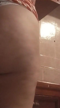 Mom Walks Around the Kitchen in a Thong