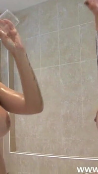 Dani Thompson's oiled boobs