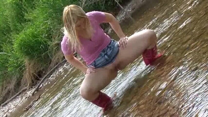 Femdom Austria: Pissing outdoors with stunning blonde