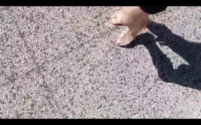Jon Arteen: Jon Arteen Walks Barefoot on the Street Outdoors, the Boy...