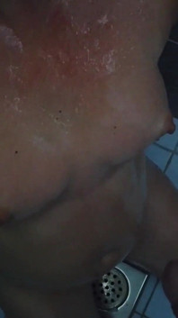 Pregnant Brunette Gets Pissed on Her Oiled Tits