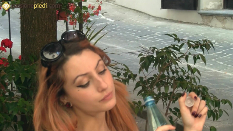 Foot Fetish HD: Thena, stunning babe smokes a cigar and plays with her...