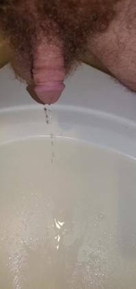 Closeup of My Cock Peeing in the Sink 1