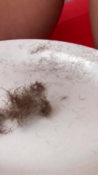 Hot MILF shaves her pussy