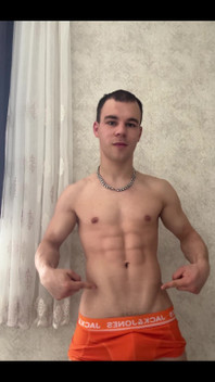 Cute Athlet Boy Showing Muscle