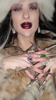A Gothic Witch Seduces You During a Winter Snowstorm with Her Black Magic Rituals, Long Nails and Fur.
