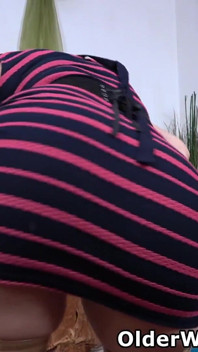 Sexy Mature Victoria Strips off Her Dress and Starts Pumping Her Shaved Pussy with Her Fingers