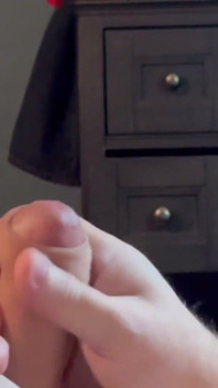 Topless Wifey Gives Footjob