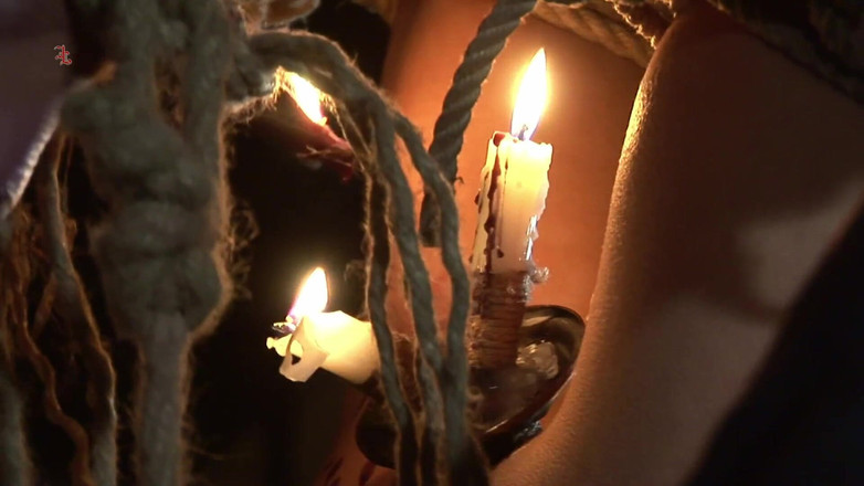 Inquisition and prison world: 女巫倒挂着,被黑蜡淋湿