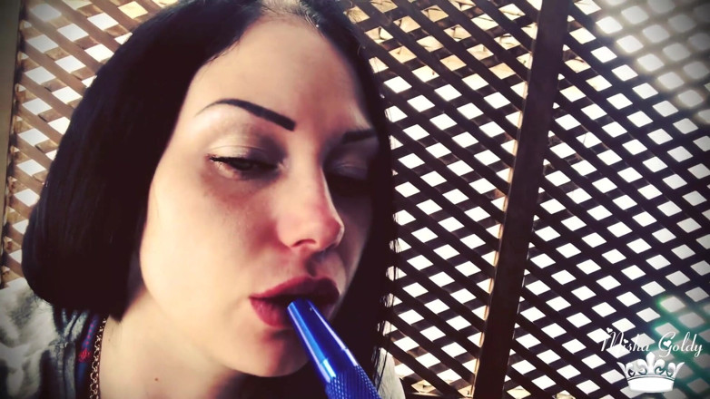 Goddess Misha Goldy: Blowing shisha smoke from itching nose and scratching it all...