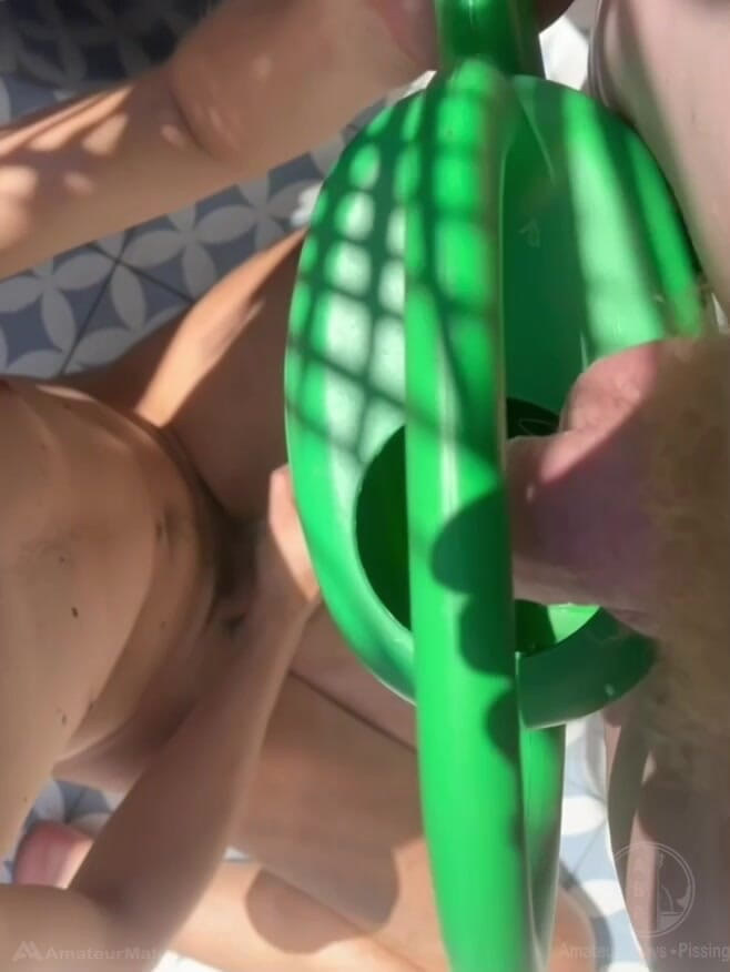 AmateurBoysPissing: Ginger Guy Peeing in a Watering Can in Front of...