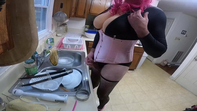 Jon Screcrow: Big Fake Tits Crossdresser Doing Housework in Corset and Heels