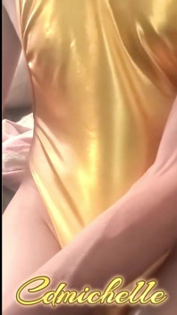 Cdmichelle Wearing Gold Bodysuit