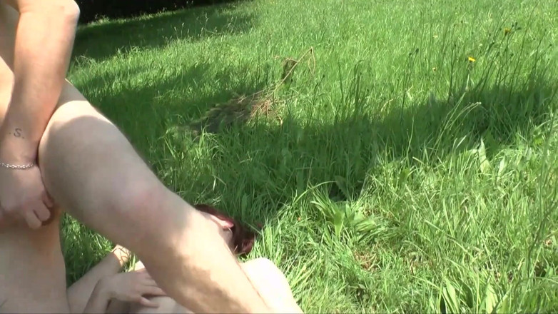 Young Sinner: Young redhead gives a blowjob in a park and she...