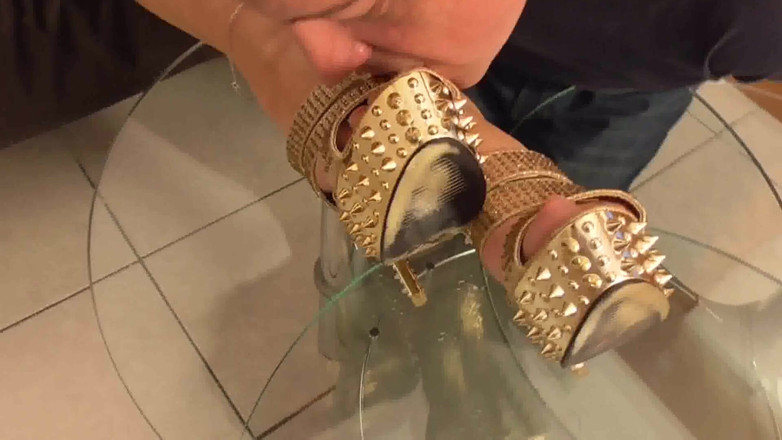 Foot Girls: Mistress lets her slave lick her golden shoes