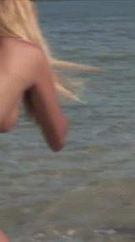 Ebony skin on the seashore is fucked by two big cocks that are eager for her hot holes