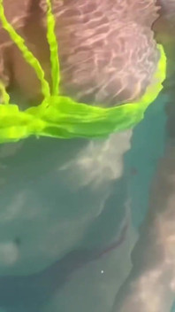 Artemisia Love Swimming in the Pool Flashing Her Big Juicy Boobs and Smoking a Cigarette