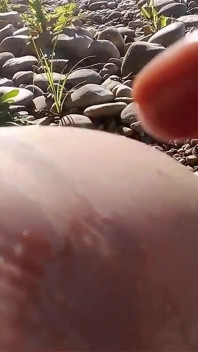 Jon Arteen Wanks Outdoor on a Pebbles Beach, the Sexy Twink Wearing Short Shorts Cums on His Thigh and Cumplay