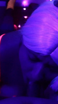 Rave Slut Sucks on a Juicy Cock