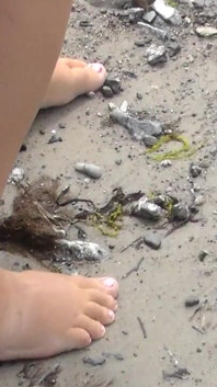 Jen Shows up Her Naked Feet in the Sand