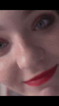 A Girl Is Messing with a Macro Camera