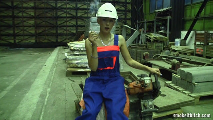 Smoke it bitch: Skinny blonde worker in the factory takes her break for...