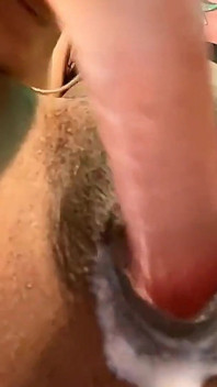 Masturbating