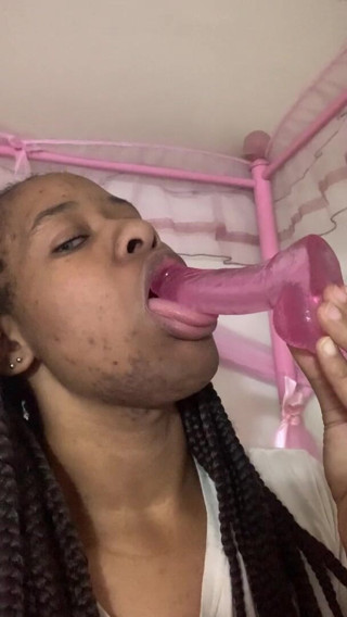 Imani Garrett: Watch me sucking on my dildo