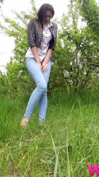 Desperate Skinny Girl in Jeans Trying to Hold Her Pee in the Forest