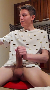 Sweet load of cum flows from this cute guy's big cock