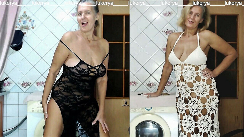 Lukerya: Lukerya excitée essaye des robes longues dans la cuisine