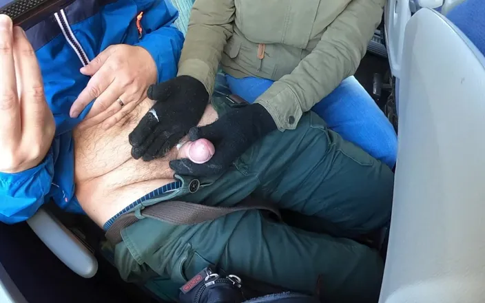 Mature_cunt: Black gloves handjob in a bus