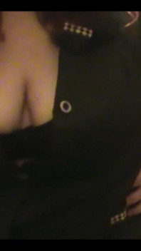 Robe-wearing Dominatrix