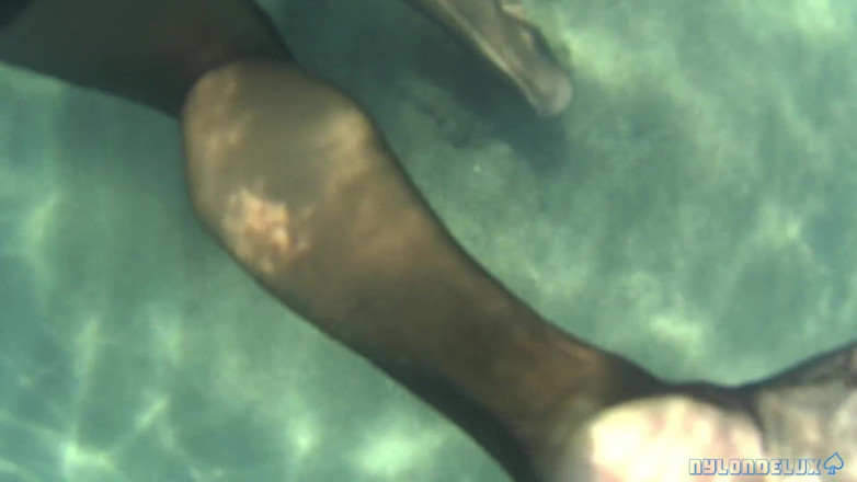 Nylondelux: Black Stocking in the Sea