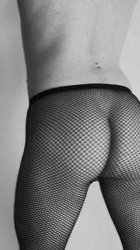 Sexy teen boy dances with only fishnets tease