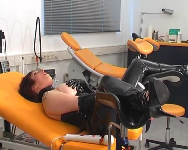 Rubber & Clinic Studio - 1ATOYS: Masturbation in rubber on the gyntable
