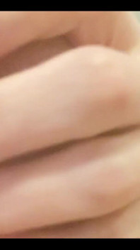 Masturbating