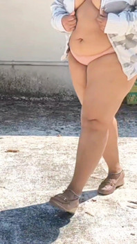 India Curvy Girl in White Jacket Strips for the Camera