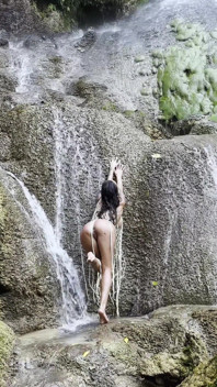 Wet Monika Fox in a Fishnet at Waterfall