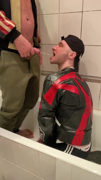 Big Man in Leather Jacket Pissing on Leather Moto Biker