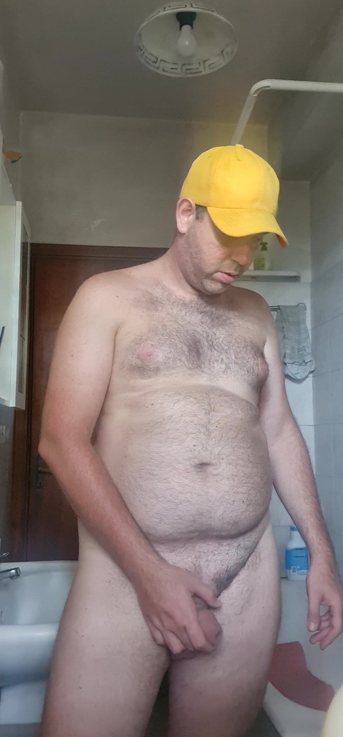 Mirko2589: Naked Boy in Bathroom with Yellow Hat