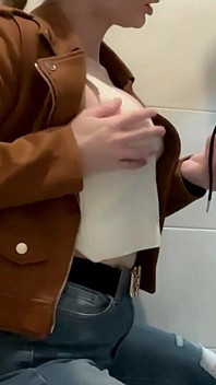 Busty Blonde Sucks Cock in the School Bathroom