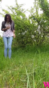 Desperate Girl Full Bladder Trying to Pee in the Forest and Smelling the Flowers