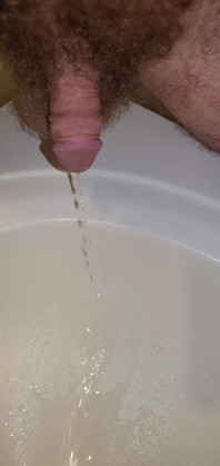 Closeup of My Cock Peeing in the Sink 1