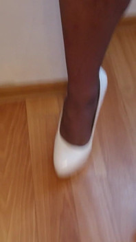 Walking in My High White Shiny Stilettos