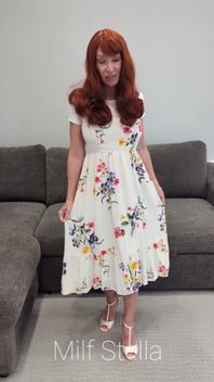 A Redhead in a Dress