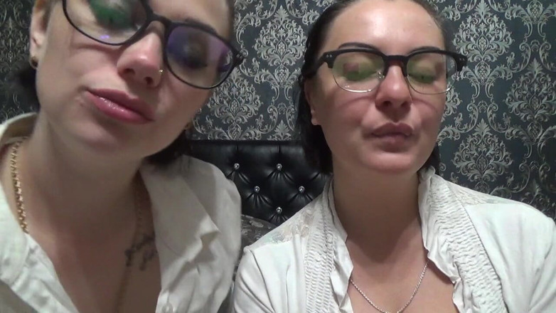 Goddess Misha Goldy: Two business women taunt you with their mouths &amp; tongues before...