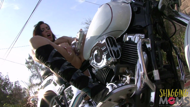 Shagging Stepmoms: Busty milf masturbating on the bike