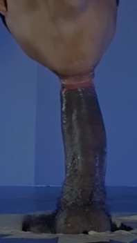 Sucking a Huge Black Cock in a Glory Hole