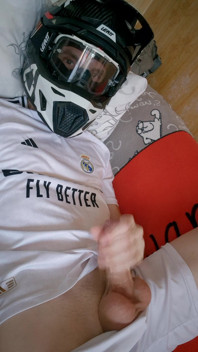 The Guy Is Wearing a Soccer Uniform and Mxhelmet with a Morning Cum